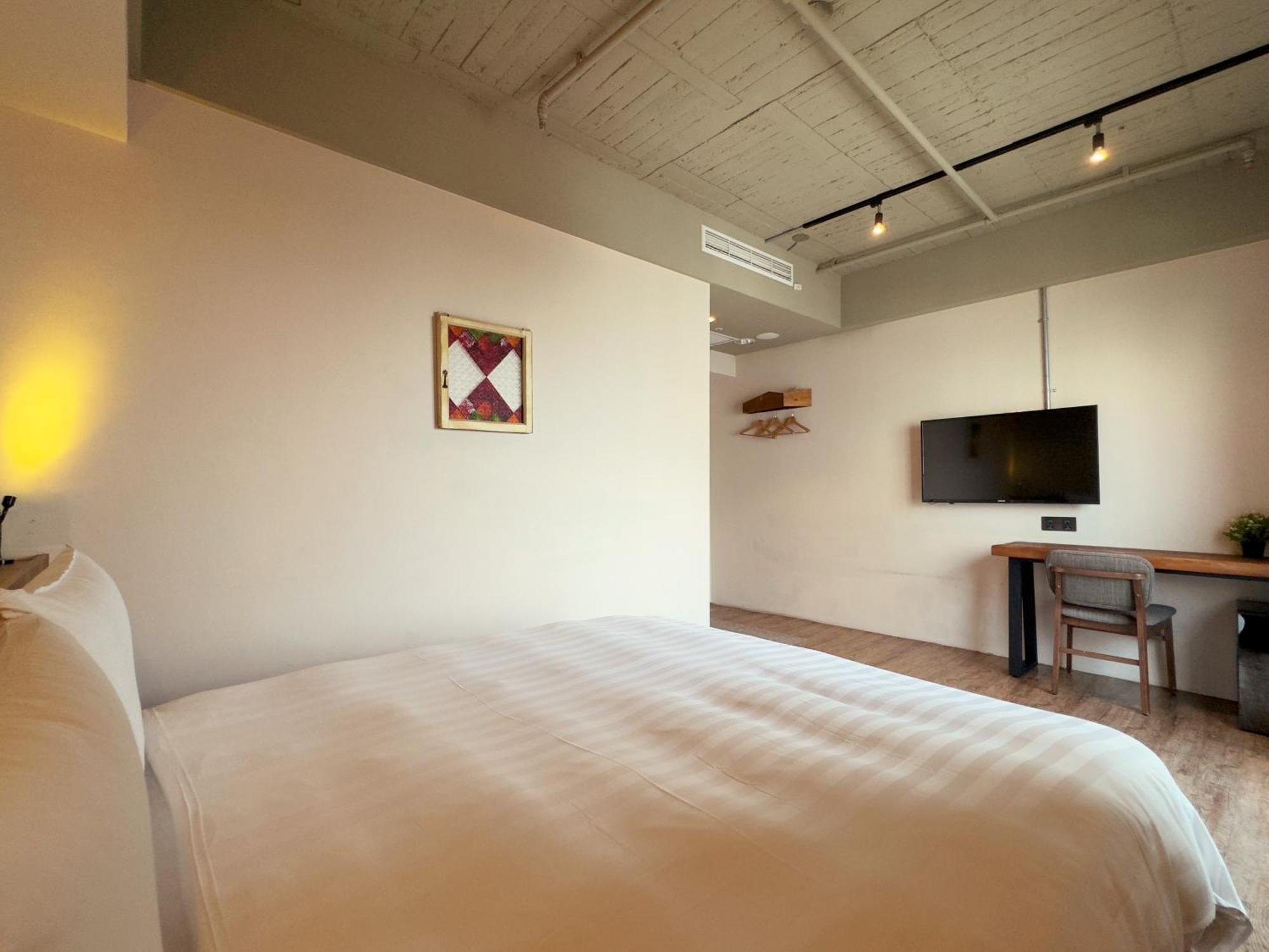 Roaders Hotel Tainan Chengda Номер фото
