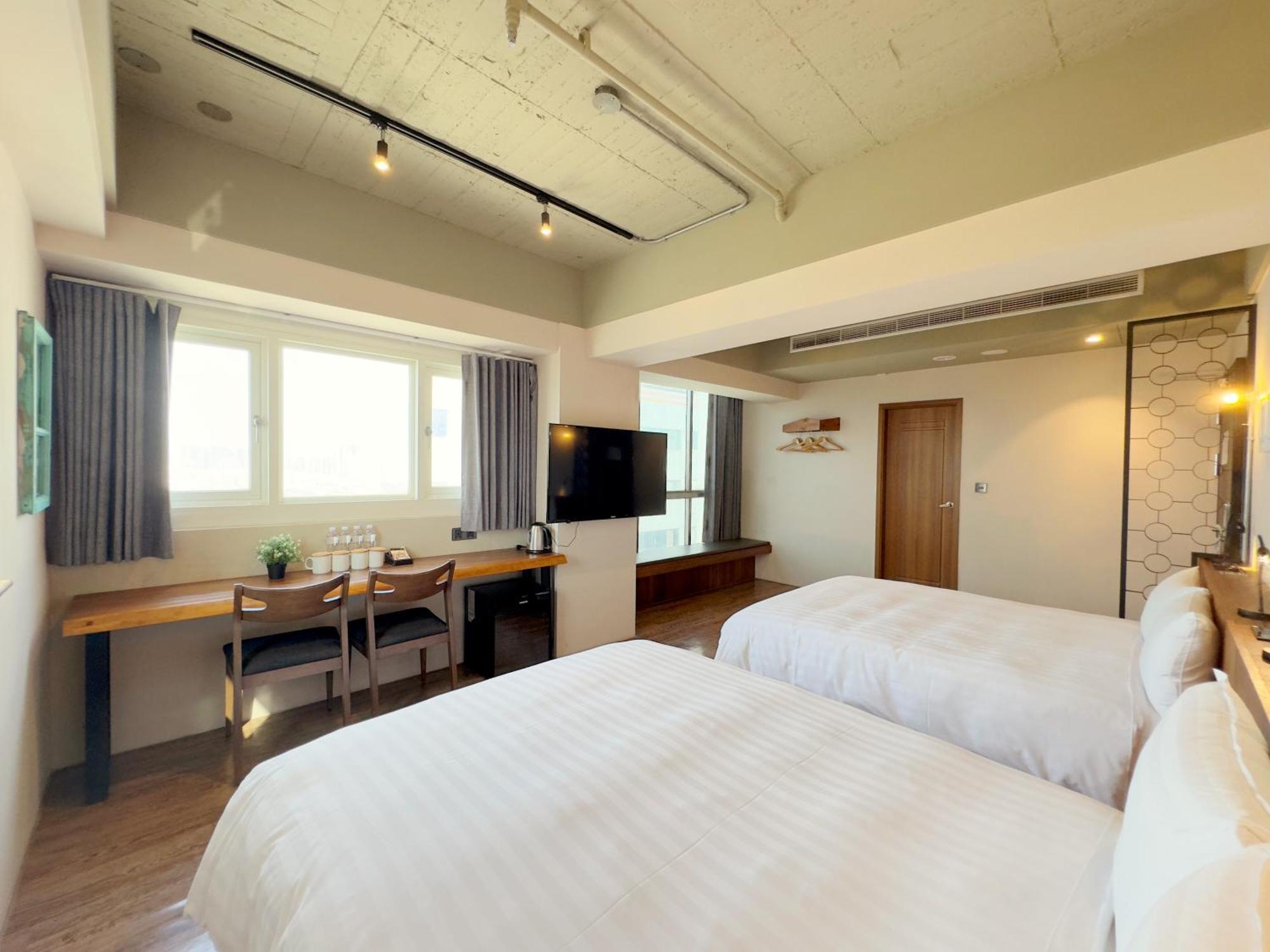 Roaders Hotel Tainan Chengda Номер фото