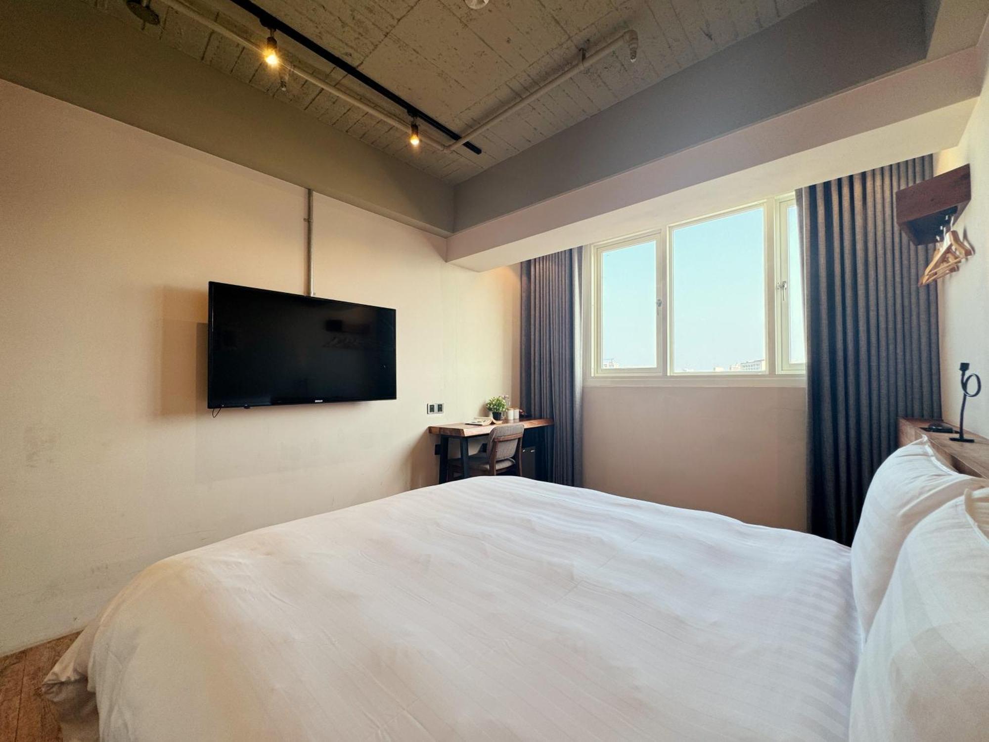 Roaders Hotel Tainan Chengda Номер фото